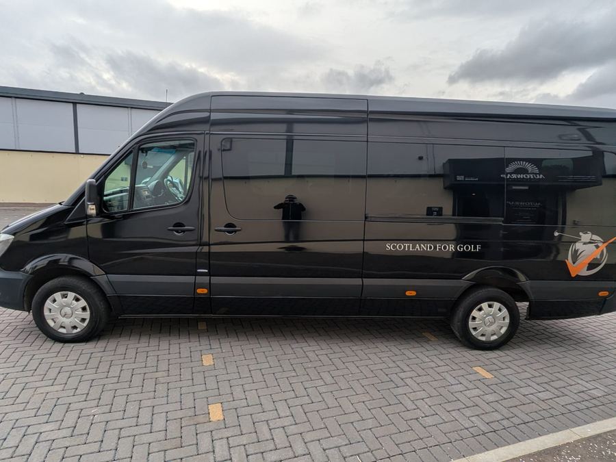 Scotland For Golf black Mercedes Sprinter van wrap