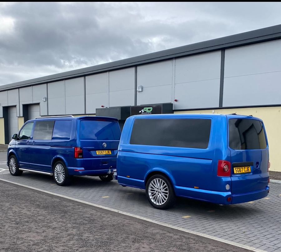 Blue VW Transporter with matching van-shaped trailer